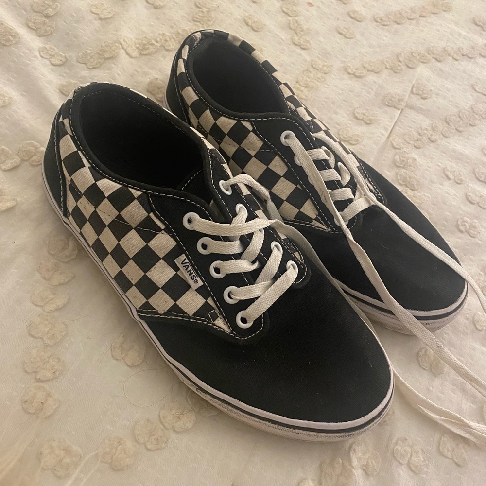 Black and white checkered vans with laces.  Size 9.5.
